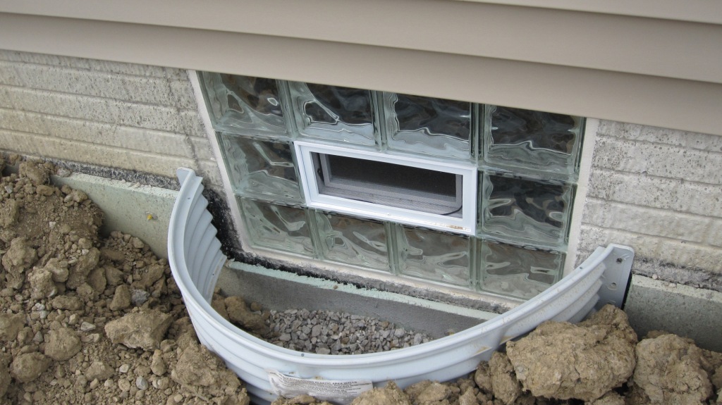inspect basement windows 40 important home exterior maintenance tasks