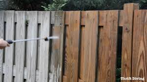 clean fences with powerwasher 40 important home exterior maintenance tasks