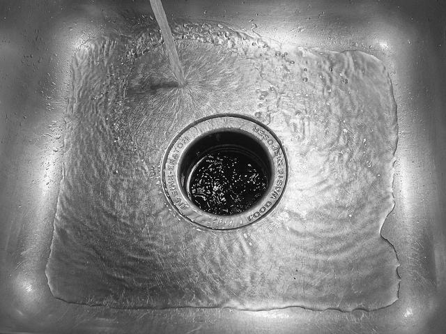 the lifespan of common household appliances and components how long will a garbage disposal last? Photo by Flickr user: https://www.flickr.com/photos/deanhochman/