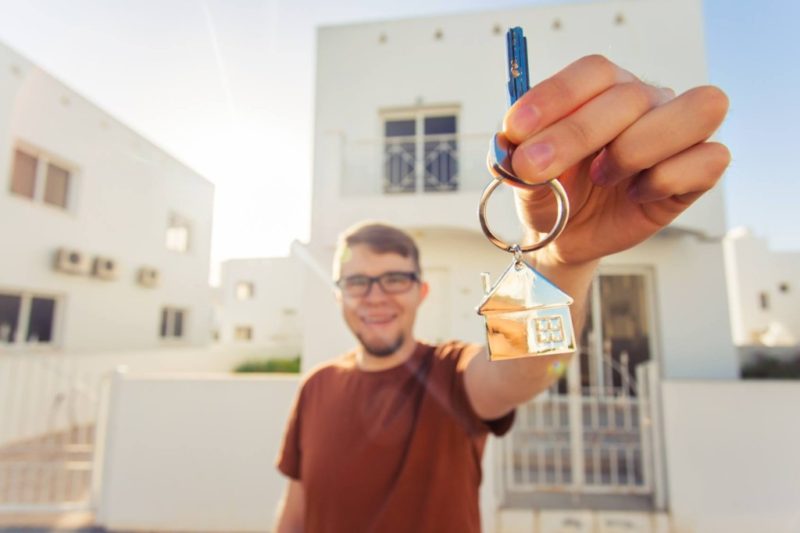 First time homebuyer celebrates getting the key to his new home