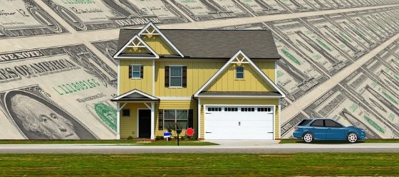 home flanked by money saved by home warranty