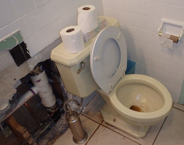 clogged toilet in bathroom