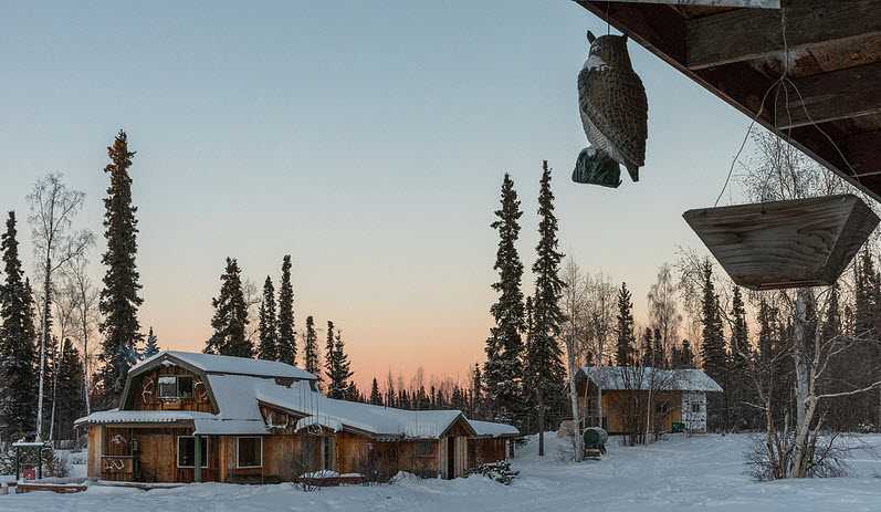 Front of snow covered home in Alaska