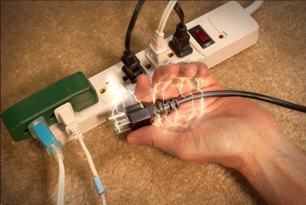man receiving electrical shock from outlet